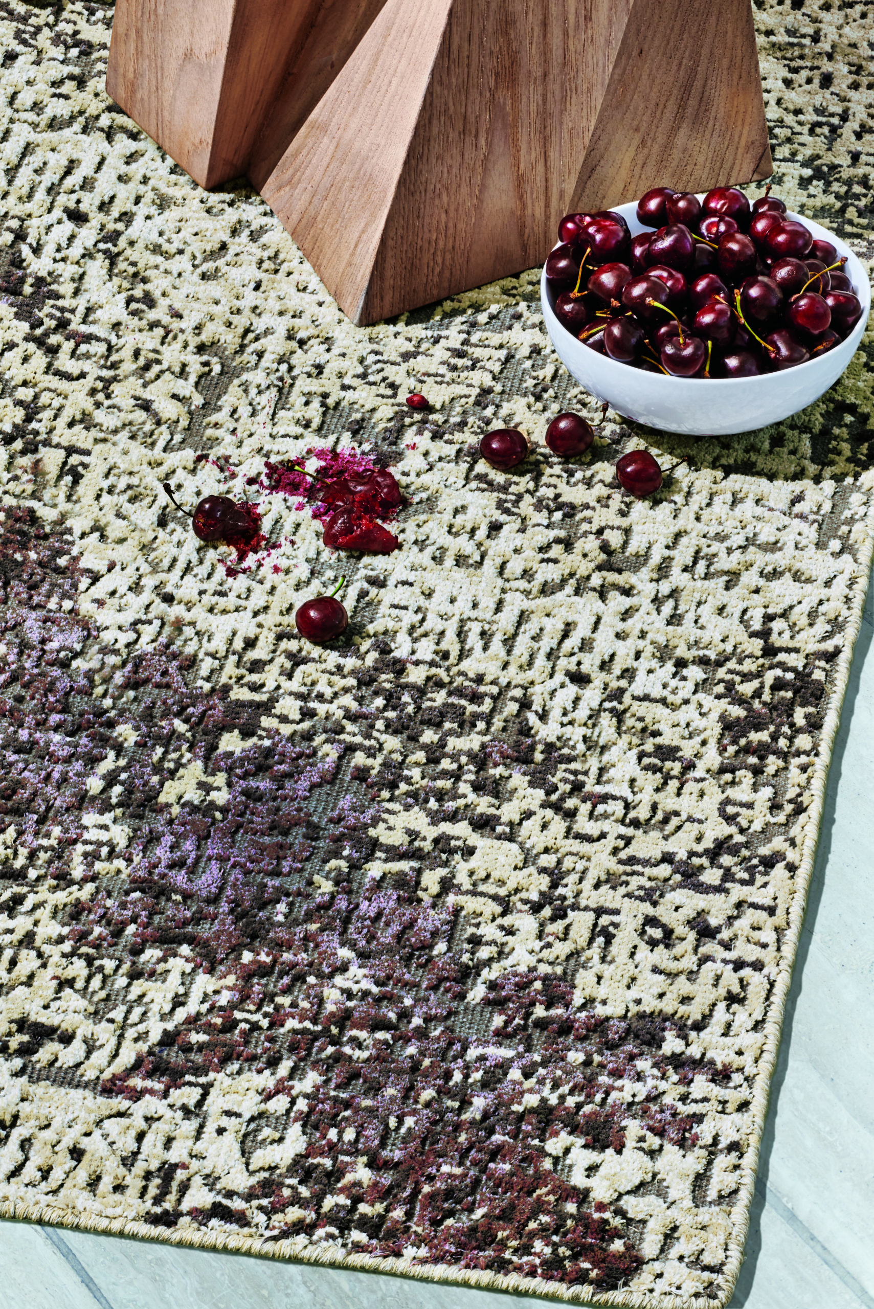 Perennials' Weitzner rug with cherry stains.