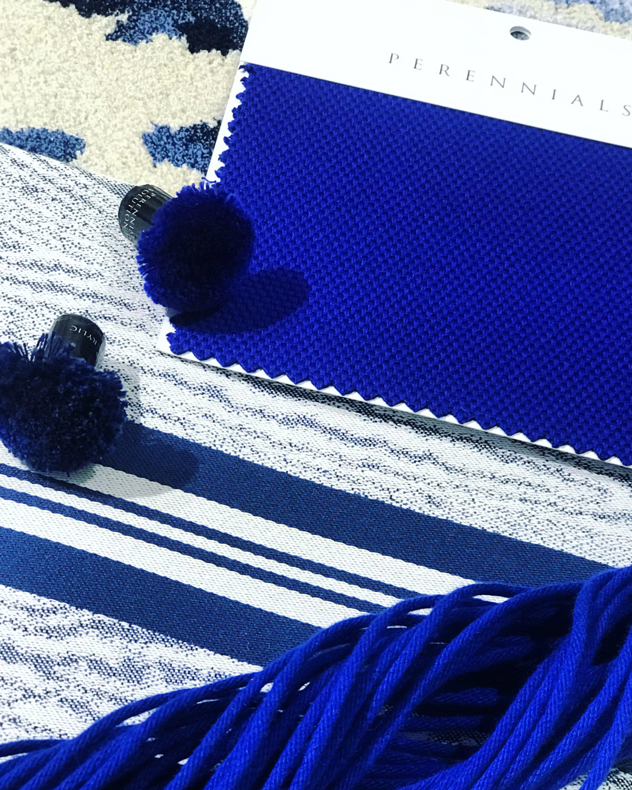 Pantone's color of the year, Classic Blue is part of the wide variety of products offered in Perennials' fabrics and rugs.