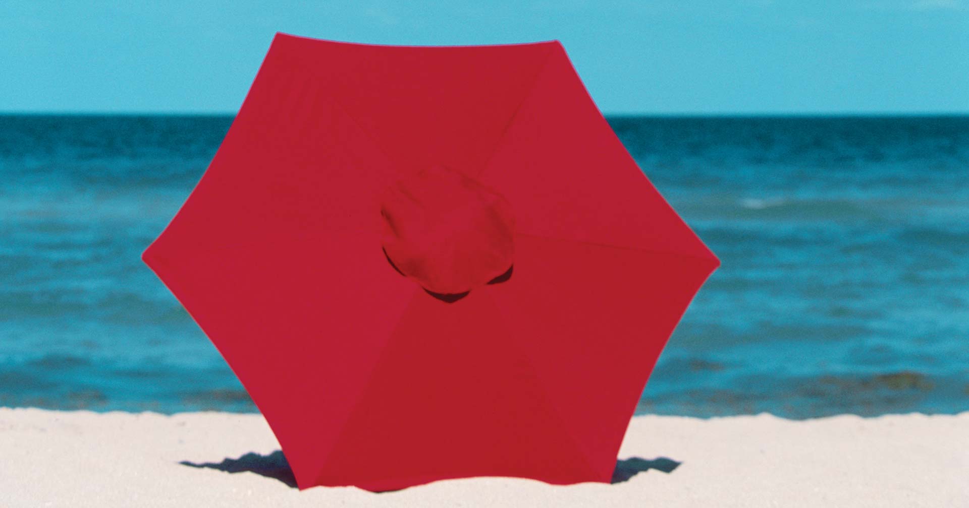 Cabana collection red umbrella at the beach