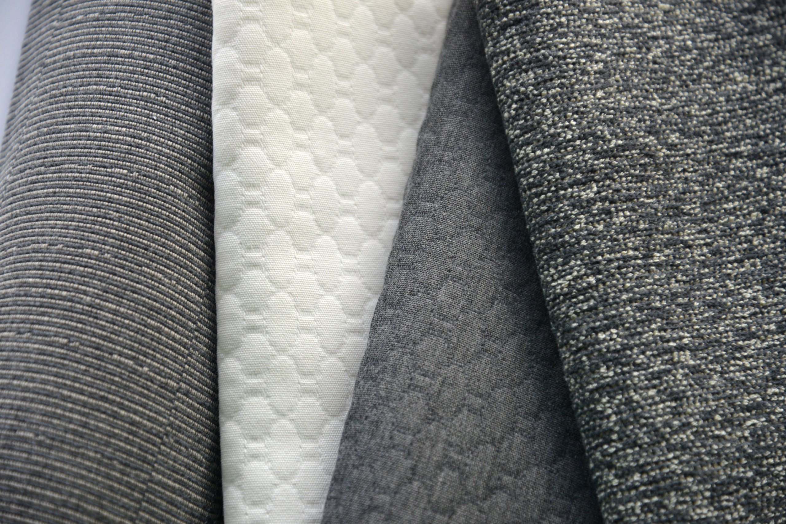 Gray and cream fabrics from the More Amore collection by Perennials
