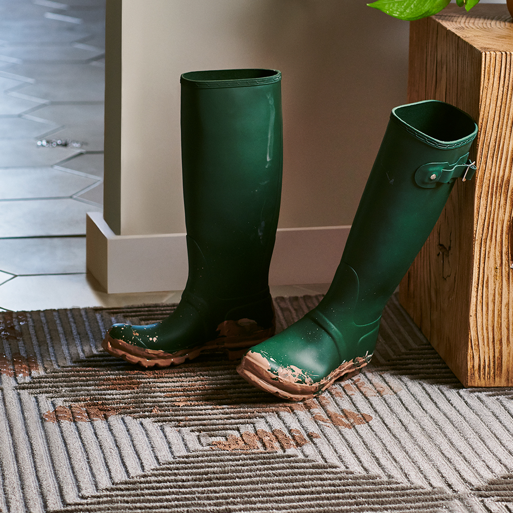 Muddy Boots on Rug