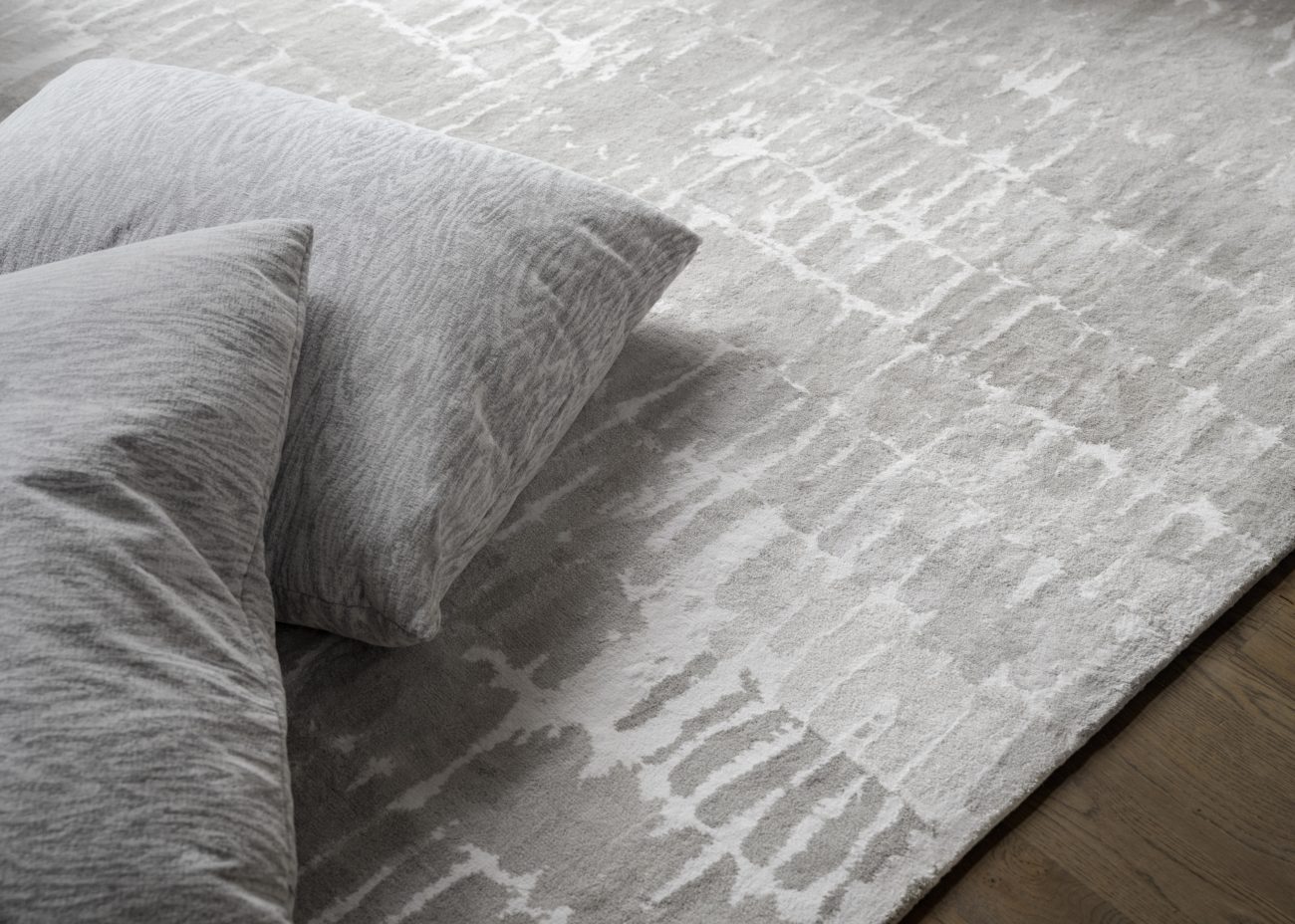 Knotty Fabric on Pillows with Brushwork Rug